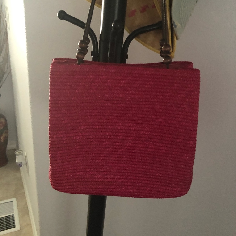 ST Johns Bay hot pink straw bag